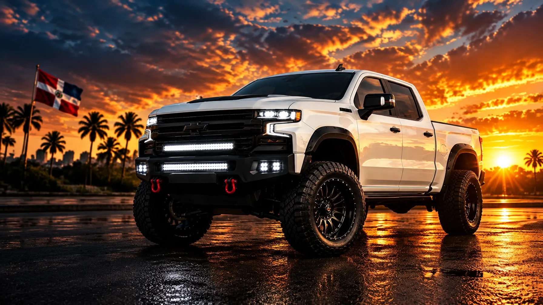 White lifted Silverado with custom bumper and LED lighting at sunset